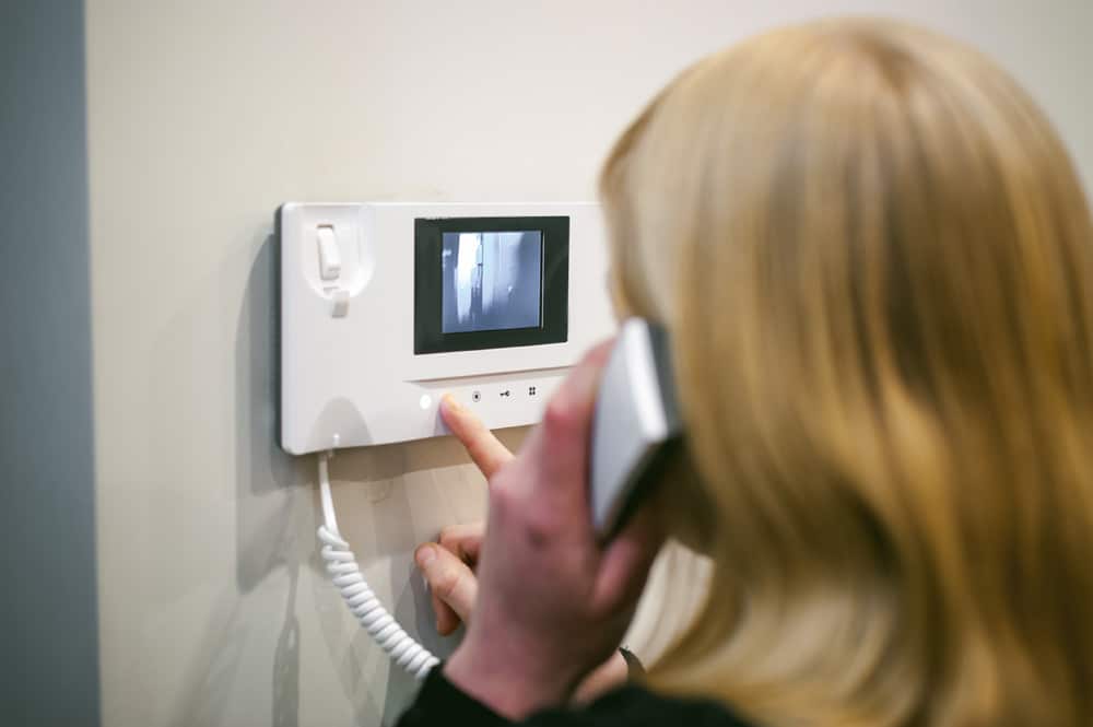 Lady using Intercoms